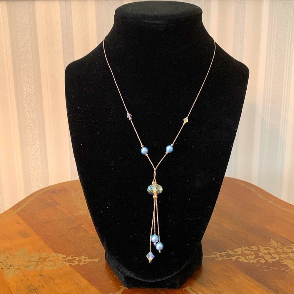 Light blue pearl + crystal costume jewelry. 7” from nape to lowest point of Y.